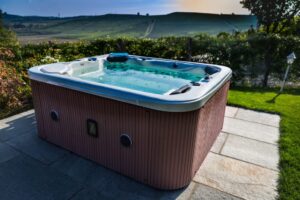 Hot Tub in a BackyA hot tub sits ready for light demolition and removal service with Overland Haulingard