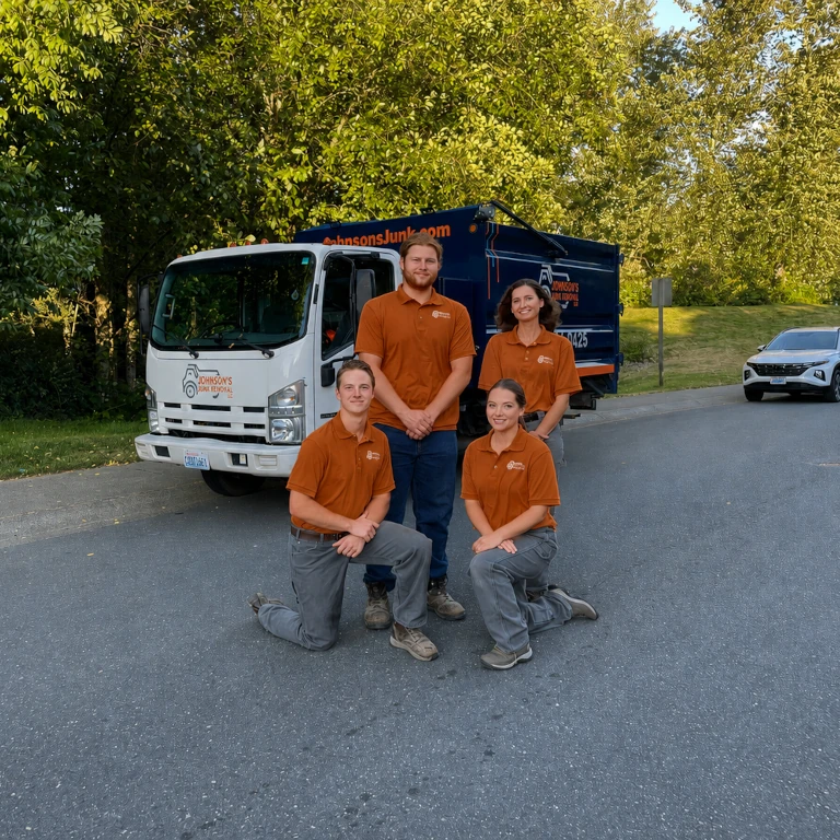 The crew at Johnson's Junk Removal ready to provide office cleanout services