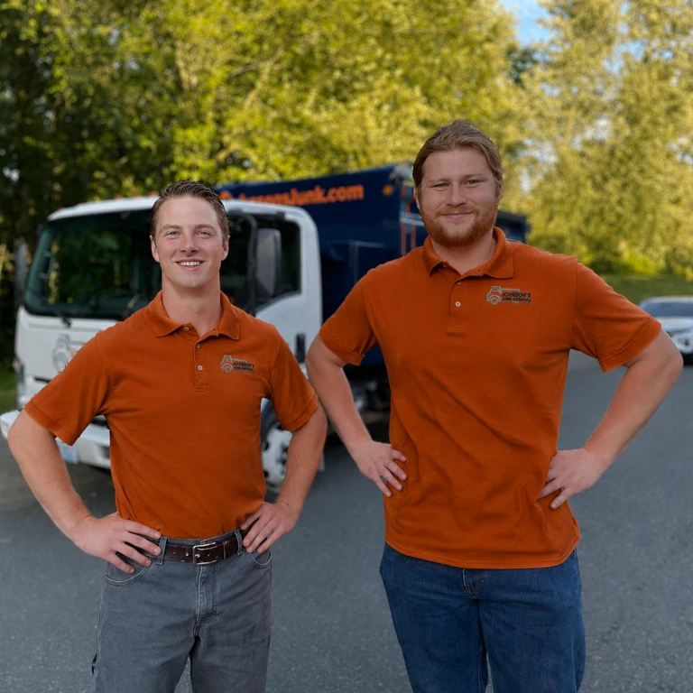 Johnson's Junk Removal professional posing before performing junk removal services